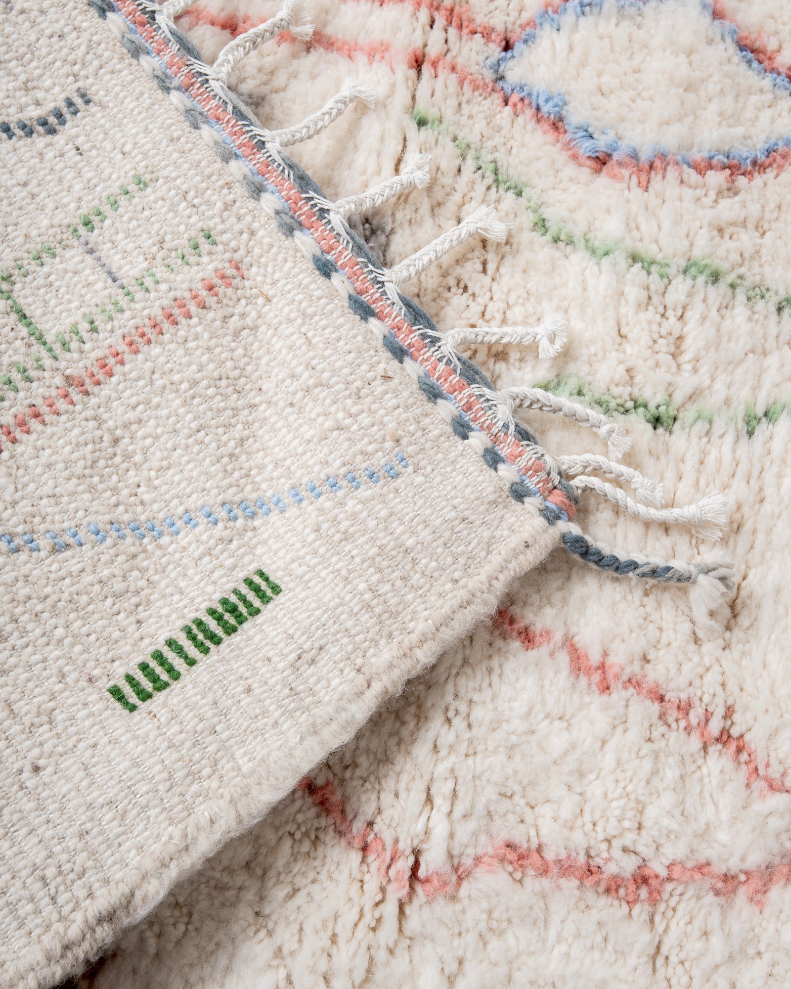 Modern, designer, handcrafted Berber rug from Morocco. Beniourain carpet with beautiful colours and patterns and fluffy wool texture.